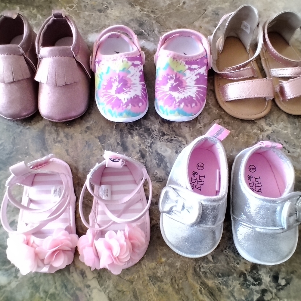 Gently worn baby girl sandals and soft bottom shoes